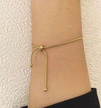Bracelet doré boule simple réglable