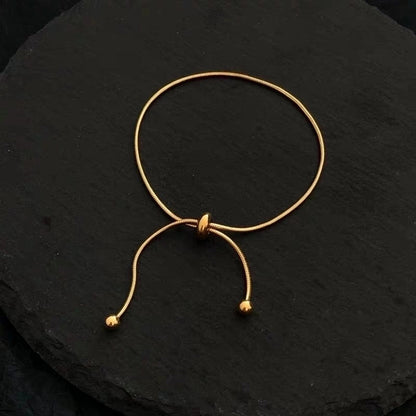 Bracelet doré boule simple réglable