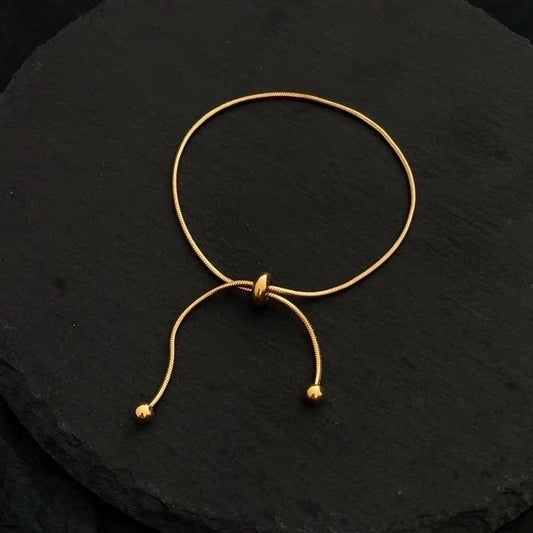 Bracelet doré boule simple réglable
